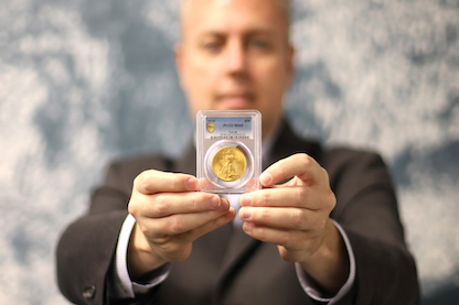 Ian Russell holding the world's most valuable coin - the legendary 1933 Saint-Gaudens Gold Double Eagle